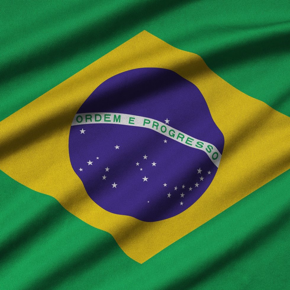 brazil-flag-is-depicted-on-a-sports-cloth-fabric-with-many-folds-sport-team-waving-banner.jpg